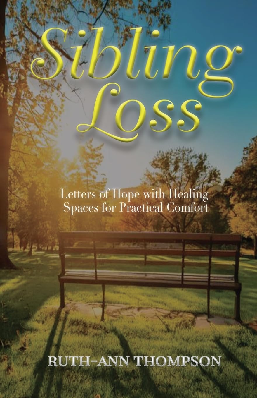 The cover of Sibling Loss, showing an empty park bench under autumn trees at sunset